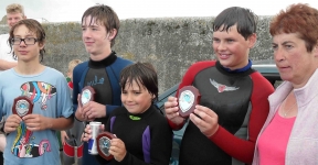 Marina with the happy junior winners: Phillip, Aaron, Eoin & Conor. Photo: DQM